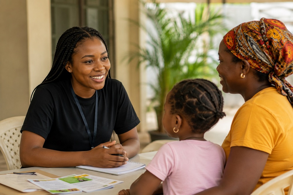 Volunteer engaging with children during community outreach.